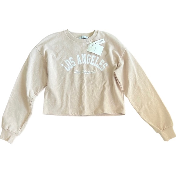 Nwt Bershka long sleeve Los Angeles the hippest crop crew neck size medium beige - Picture 1 of 4